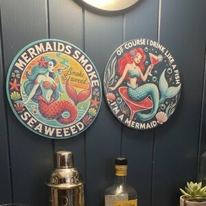 DECORATIVE TWO MERMAIDS TIN SIGNS WITH AQUA GLASS SEA HORSE.